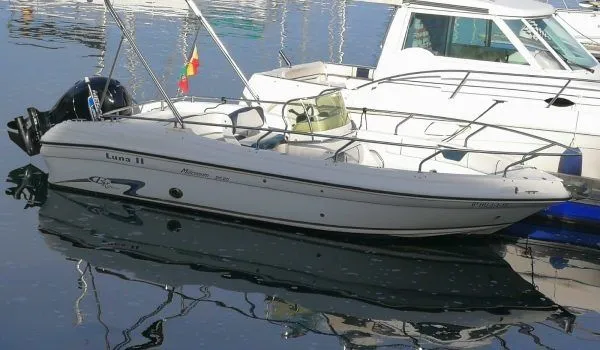 Explore Isla Canela on a 5.95m Rental Motor Boat Rancraft 20.20