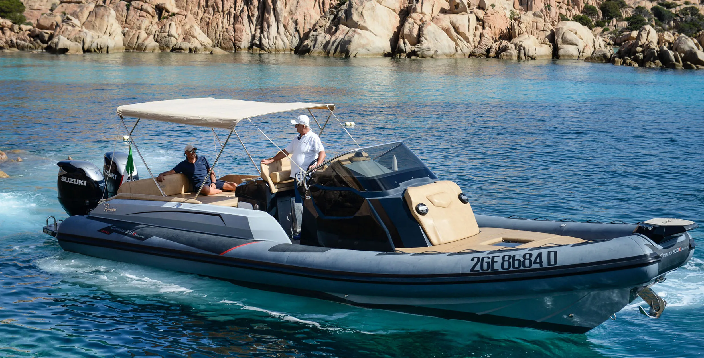 Explore Cannigione on a 12m Rental Motor Boat Ranieri 35 Cayman