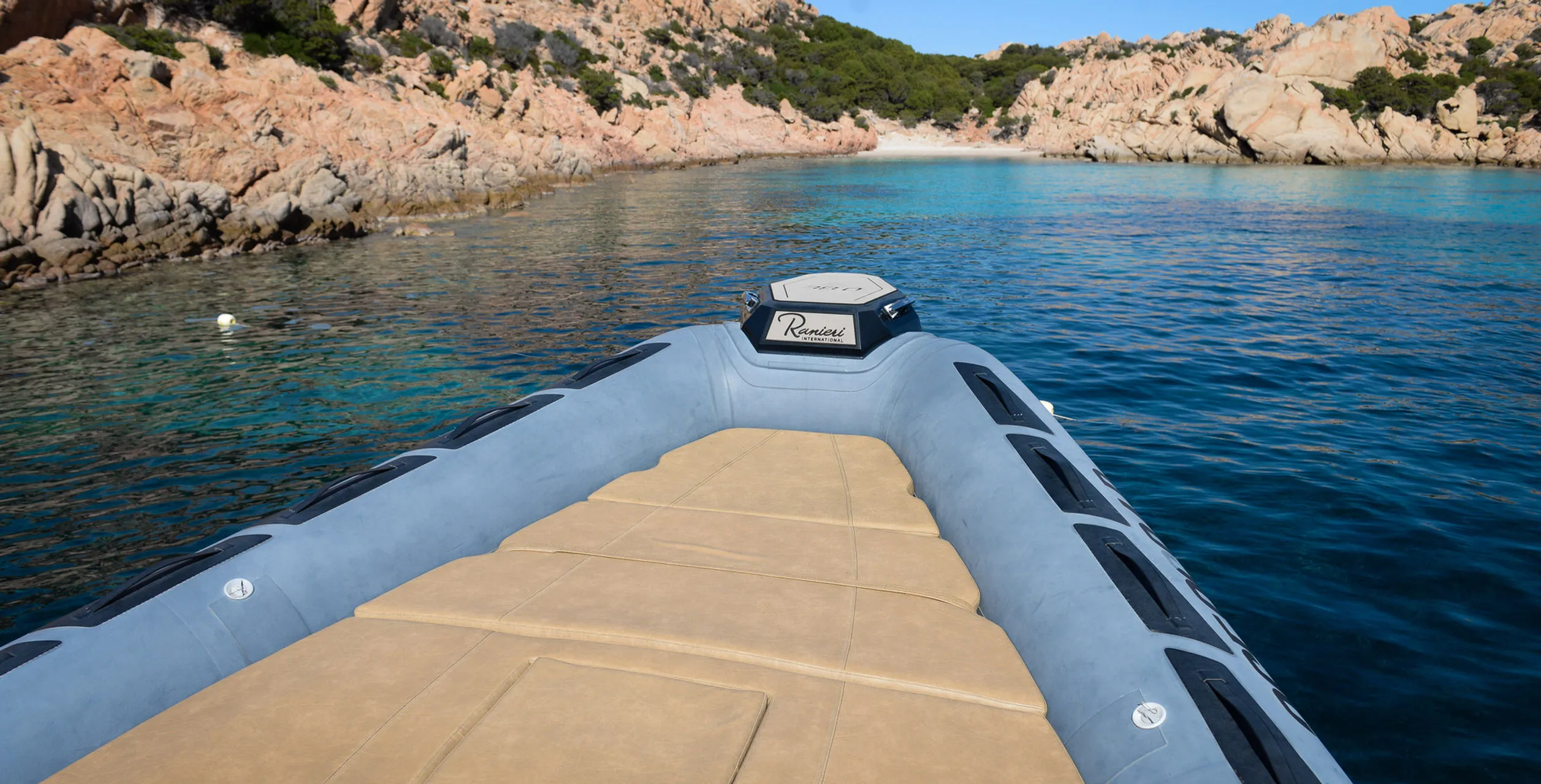 Explore Cannigione on a 12m Rental Motor Boat Ranieri 35 Cayman