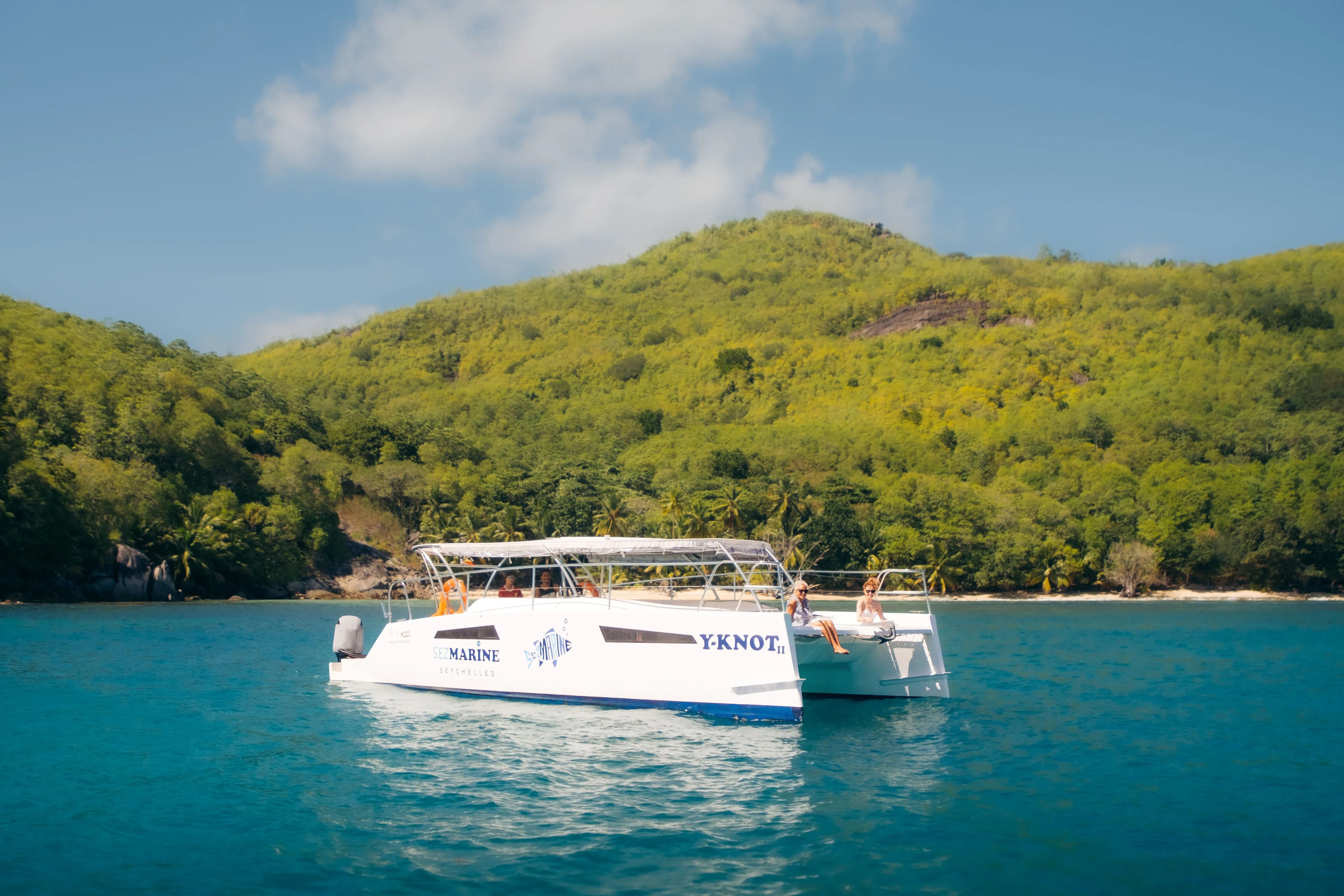 Explore Eden Island on a 10m Rental Power Catamaran Rayvin 330