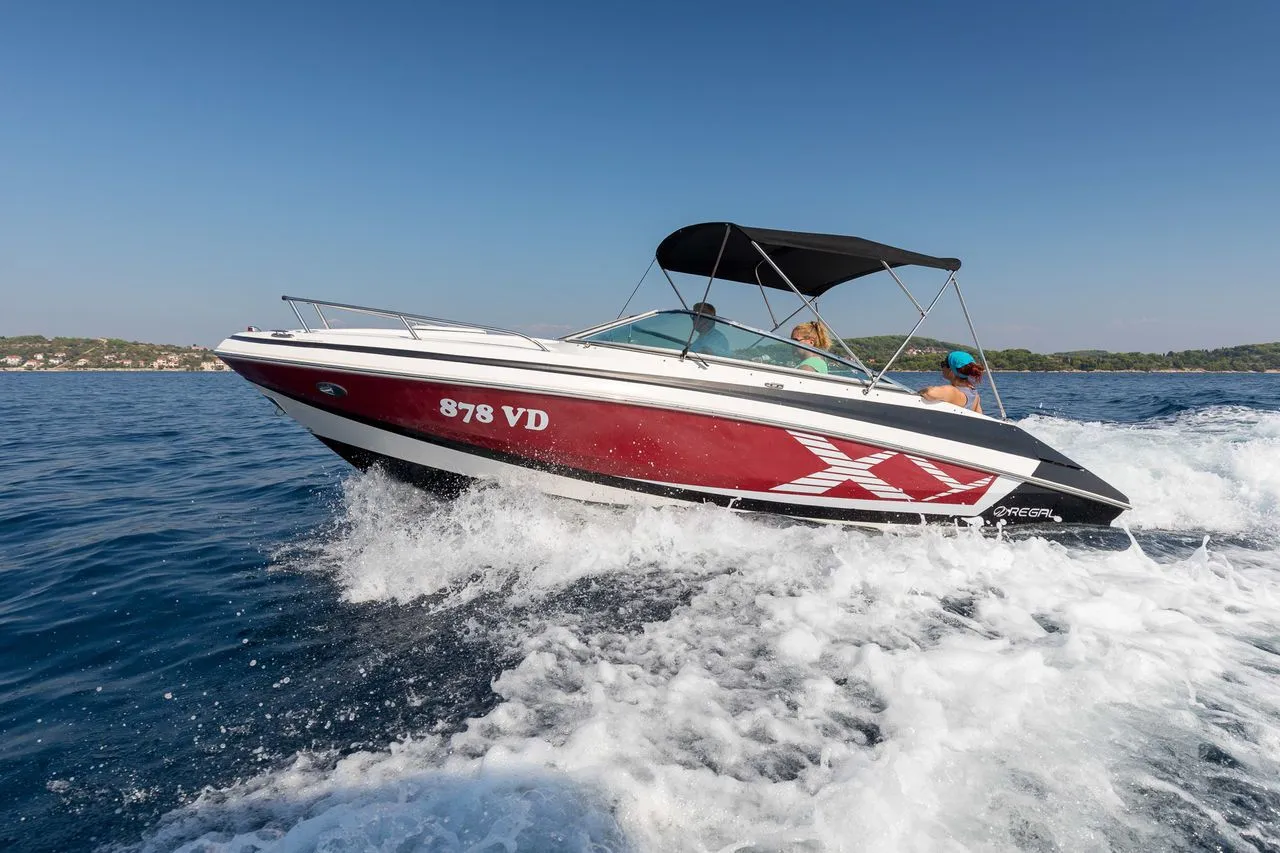 Explore Tribunj on a 6.7m Rental Regal 2250