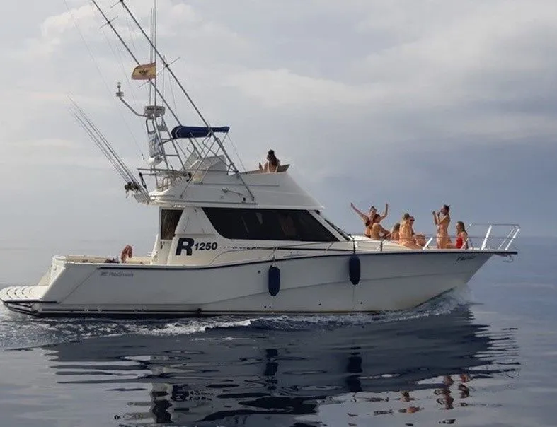 Explore Can Picafort on a 12.5m Rental Motor Yacht