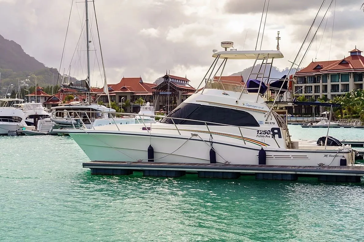 Explore Eden Island on a 11.9m Rental Rodman 1250
