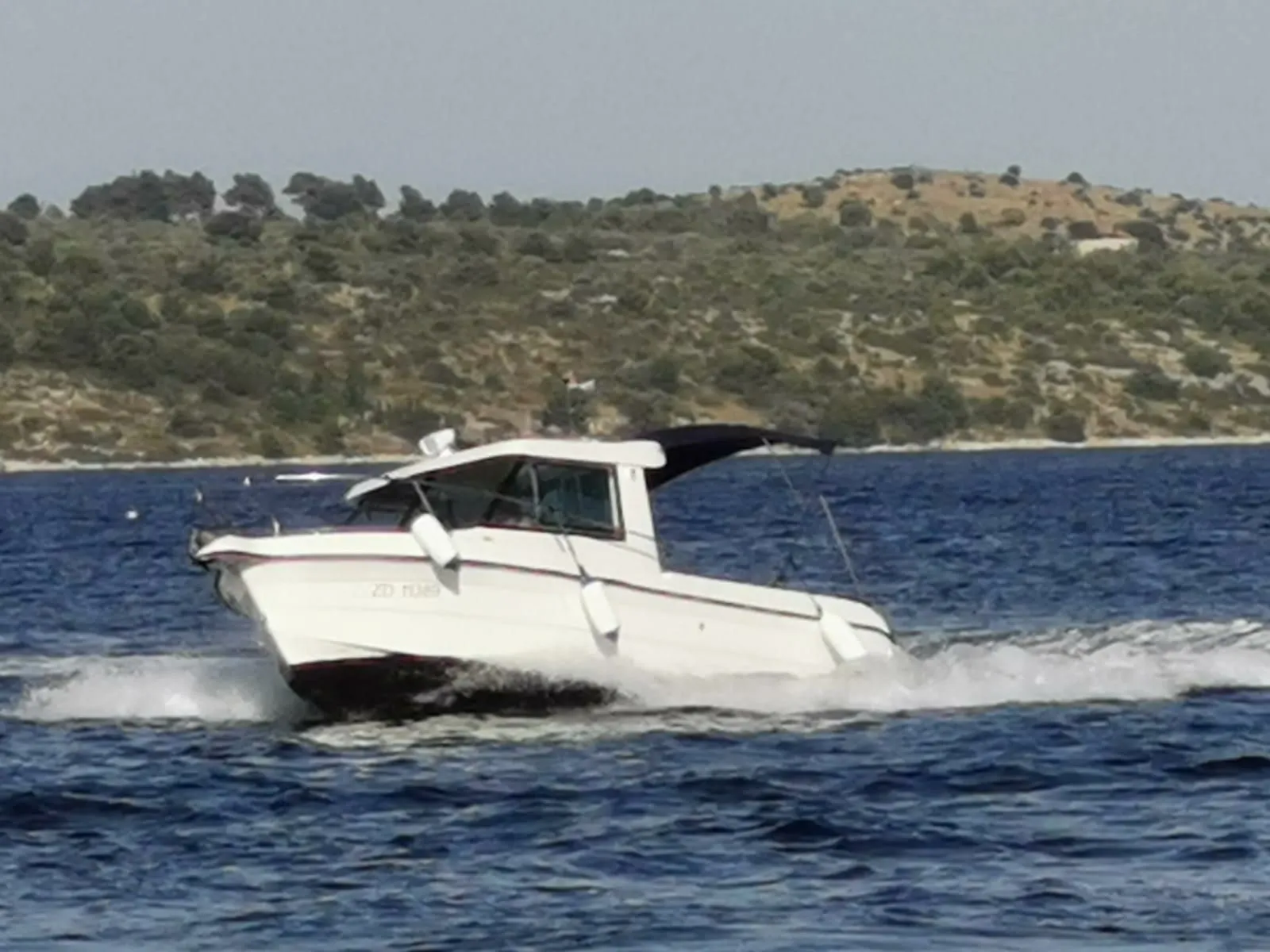 Explore Petrčane on a 6.99m Rental Motor Boat SAS Vektor 700