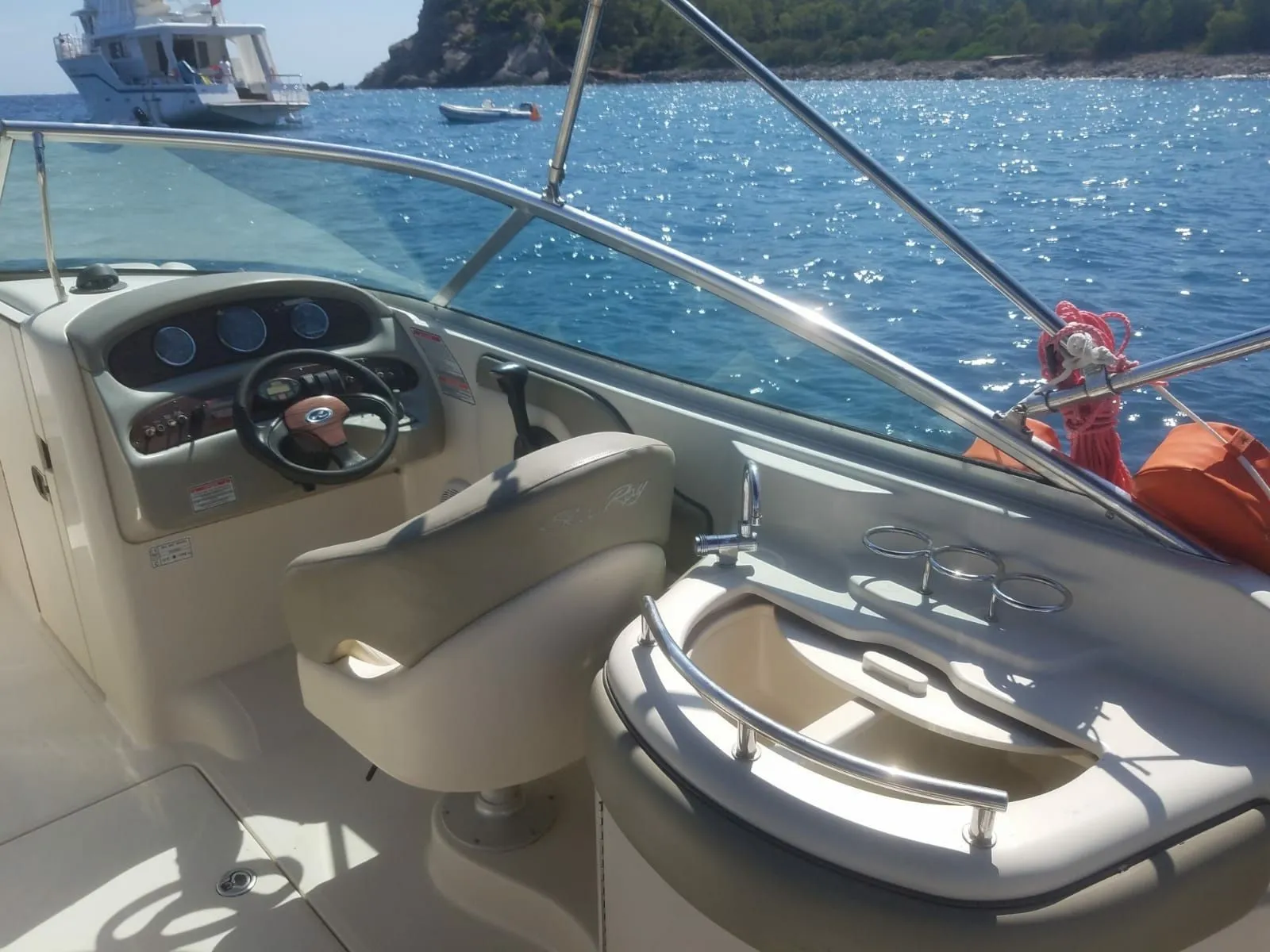 Explore Cala Jondal on a 9m Sea Ray 270 Motor Boat Rental