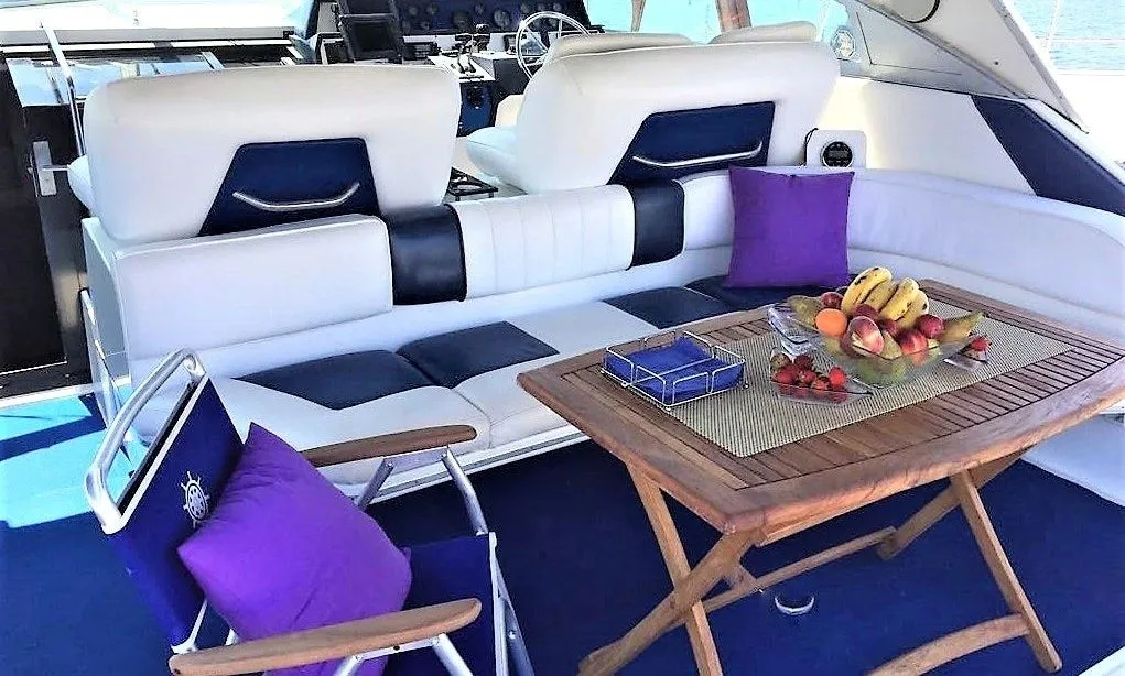 Explore Port de Pollensa on a 14.66m Rental Motor Yacht Sea Ray 460