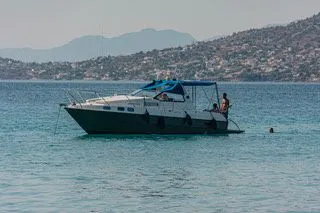 Explore Salamina on a 9m Rental Motor Yacht Sealine 28
