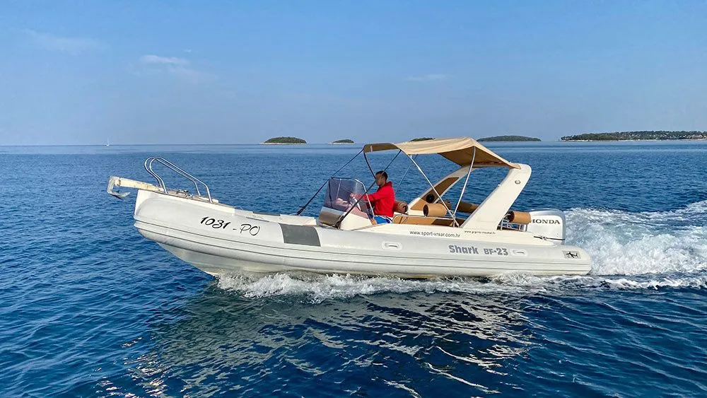 Explore Vrsar on a 7m Rental Shark 23