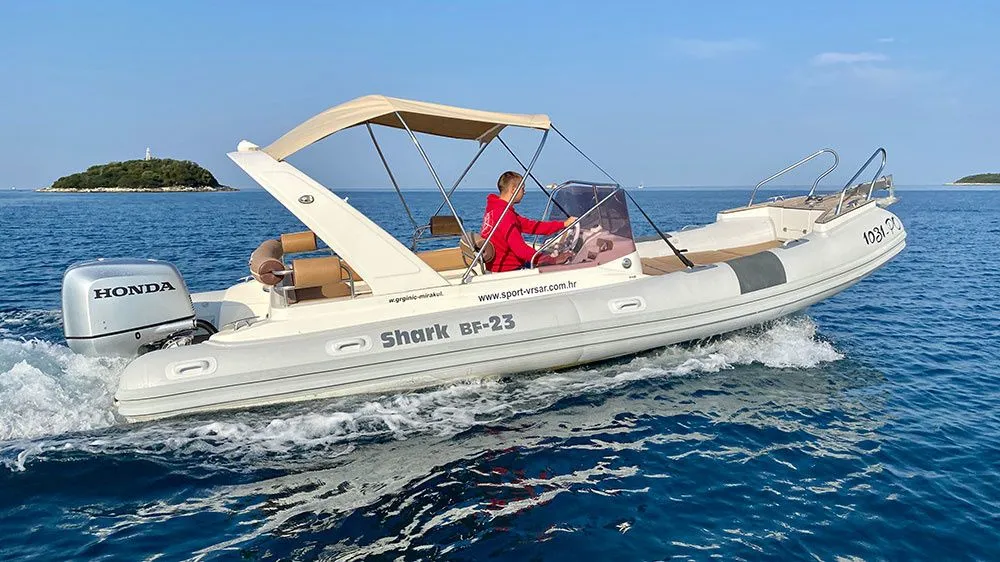 Explore Vrsar on a 7m Rental Shark 23