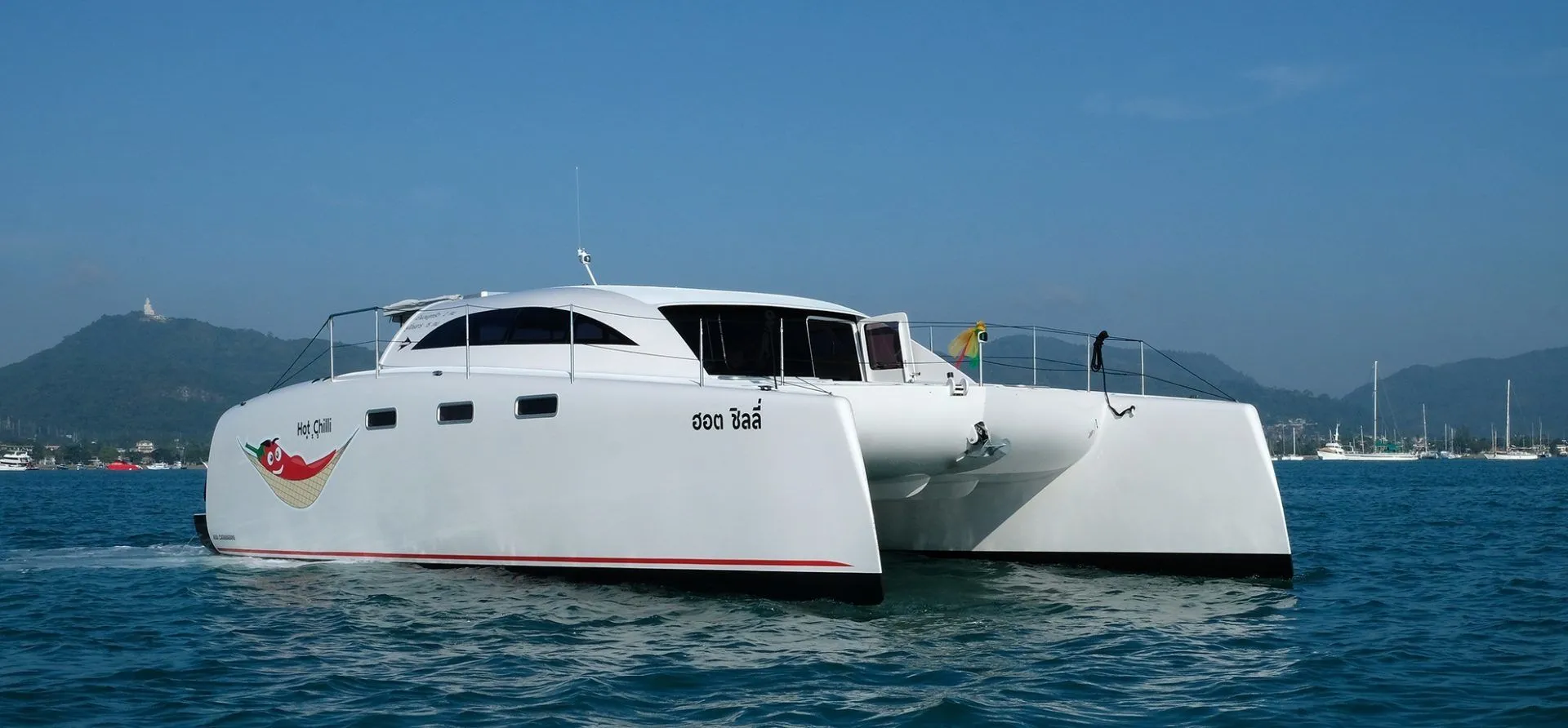 Explore Chalong on a 11m Stealth 38 Power Catamaran Rental